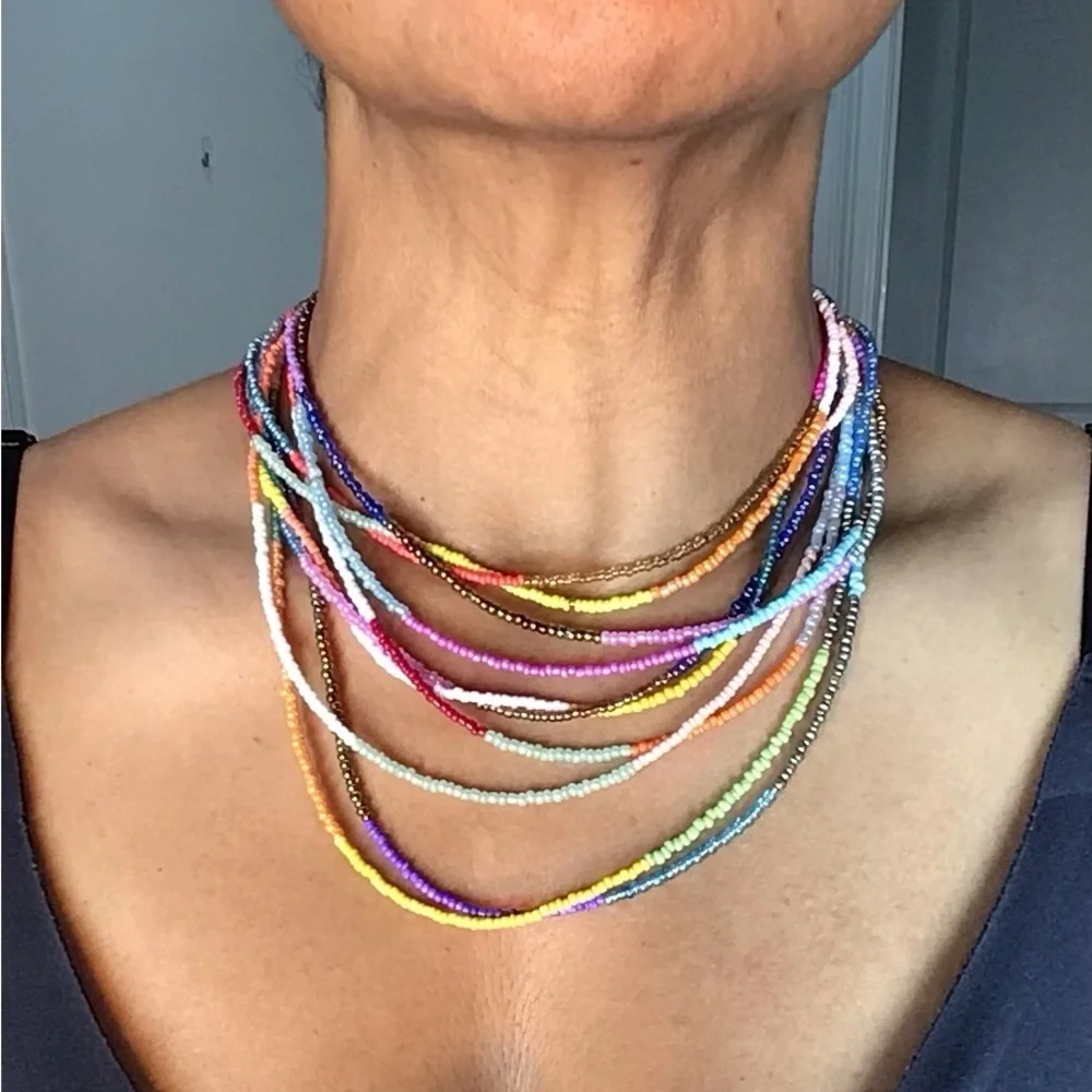 Multi-Colored Multi-Strand Glass Beaded Necklace, Bracelet, & Earring Set.